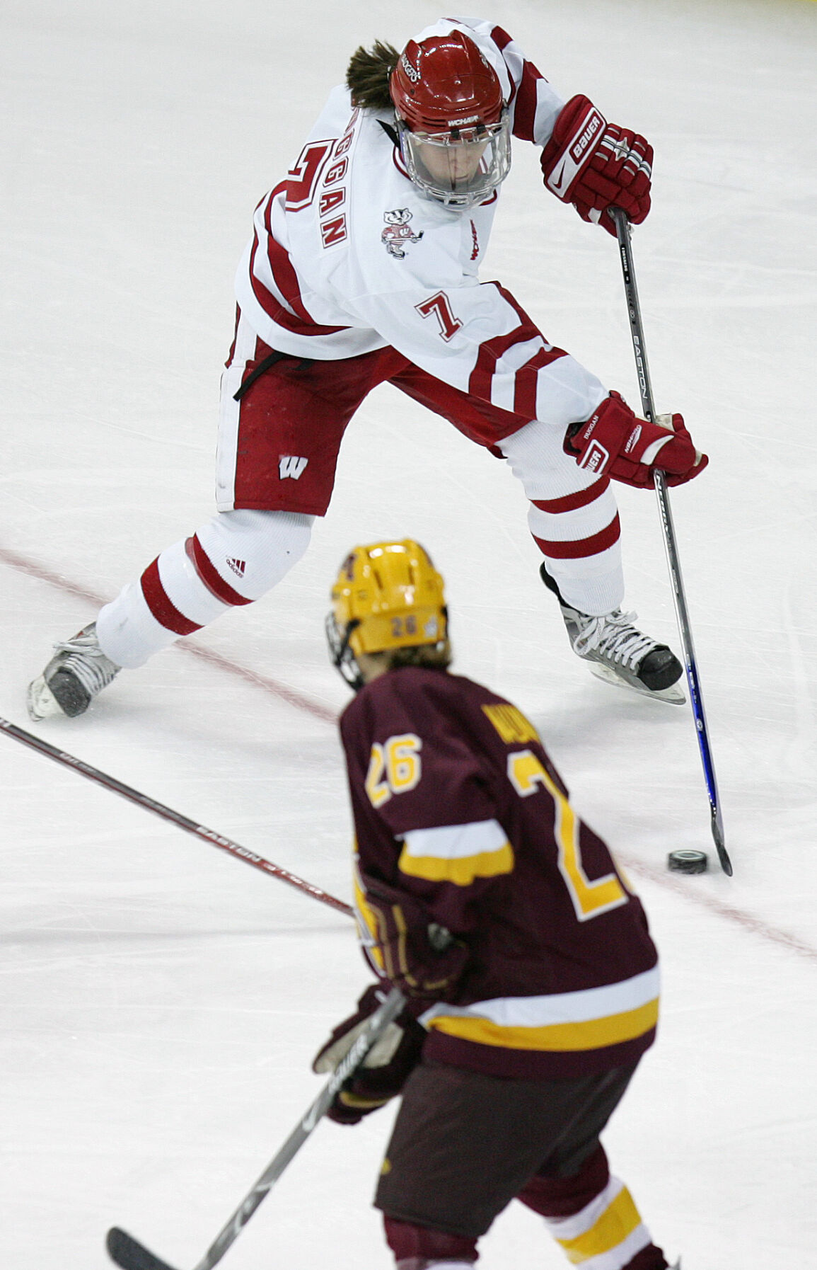 Handling the puck against Minnesota